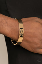 Load image into Gallery viewer, Paparazzi Hope Makes The World Go Round Gold Bracelet
