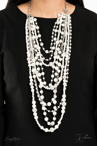 The LeCricia a multiple string of beautiful pearls that drape down the chest.